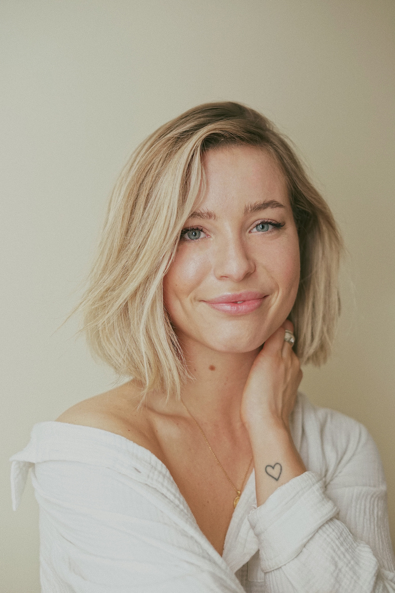 Woman in White Off Shoulder Shirt